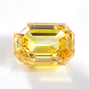 1.06 Fancy Vivid Yellow Orange Emerald