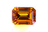 0.69 Fancy Orange Cognac Emerald